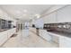Bright, stylish kitchen boasts granite countertops and stainless appliances at 3192 Tullio Way, Henderson, NV 89052