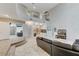 Open-concept living area featuring a spiral staircase, tile flooring, and an airy atmosphere at 3192 Tullio Way, Henderson, NV 89052