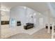 Spacious living room with high ceilings, tile floors and cozy seating at 3192 Tullio Way, Henderson, NV 89052