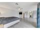 Expansive main bedroom boasting wood floors, neutral walls, and recessed lighting at 3192 Tullio Way, Henderson, NV 89052