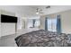 Spacious main bedroom with an en-suite bath and a great view from the large window at 3192 Tullio Way, Henderson, NV 89052