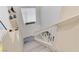 Bright stairway with modern railings, and a window allowing natural light into the home at 3192 Tullio Way, Henderson, NV 89052