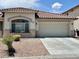 Exterior elevation showcasing a well-maintained lawn and charming curb appeal at 3261 Monaco Shores Dr, Las Vegas, NV 89117
