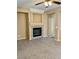 Empty living room featuring a fireplace and neutral color walls at 3261 Monaco Shores Dr, Las Vegas, NV 89117