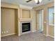 Living room with a fireplace and tile floors at 3261 Monaco Shores Dr, Las Vegas, NV 89117
