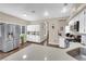 Spacious kitchen with stainless steel appliances, a large quartz countertop, and ample cabinet space at 3659 Gerri Bay Ln, Las Vegas, NV 89147