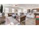Spacious open floorplan connecting the living room, dining area, and modern kitchen at 3839 Zodiacal Light St, Las Vegas, NV 89129