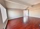 A spacious bedroom showcases an angular ceiling and wood-like floors at 4331 Sanderling Cir # 46, Las Vegas, NV 89103