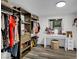 Walk-in closet with organized storage solutions and a vanity for added convenience at 4419 Lorna Pl, Las Vegas, NV 89107