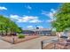 Charming single-story home with well-maintained landscaping, a long driveway and mature trees creating a serene setting at 4419 Lorna Pl, Las Vegas, NV 89107