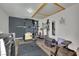Home gym featuring modern exercise equipment, wood floors, and a sleek black accent wall at 4419 Lorna Pl, Las Vegas, NV 89107