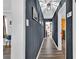 Spacious hallway with painted walls, recessed lighting, and hardwood floors at 4419 Lorna Pl, Las Vegas, NV 89107