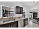 Kitchen featuring stainless steel appliances, a wine cooler, and granite countertops at 4419 Lorna Pl, Las Vegas, NV 89107