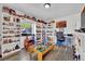 Bright playroom features built-in shelving, a work space, and wood floors at 4419 Lorna Pl, Las Vegas, NV 89107