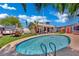 Inviting backyard pool with clear water and landscaping, perfect for relaxation and entertaining at 4419 Lorna Pl, Las Vegas, NV 89107