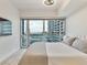 Comfortable bedroom with floor-to-ceiling windows allowing great city views and natural light at 4471 Dean Martin Dr # 1109, Las Vegas, NV 89103