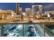 City view featuring the Las Vegas strip, multiple high-rise buildings, and a parking area at 4471 Dean Martin Dr # 1109, Las Vegas, NV 89103