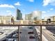 Bright Las Vegas city view from the balcony of a high-rise apartment on a sunny day with blue skies at 4471 Dean Martin Dr # 1109, Las Vegas, NV 89103