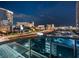 City view showcasing the skyline from a high-rise balcony with glass railing and city lights at 4471 Dean Martin Dr # 1109, Las Vegas, NV 89103