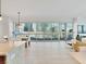 Open-concept condo featuring a dining area, a stylish living room with expansive windows with city views at 4471 Dean Martin Dr # 1109, Las Vegas, NV 89103