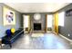 Cozy living room featuring a fireplace, tile floors and gold and yellow accents at 4682 Leeann Ln, Las Vegas, NV 89121