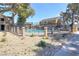 Community pool with fencing and landscaping at 4682 Leeann Ln, Las Vegas, NV 89121