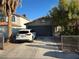 Charming single-Gathering home featuring a two-car garage and low-maintenance desert landscaping at 5353 Hollow Brook Ave, Las Vegas, NV 89142