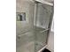 Modern tiled shower featuring clear glass and chrome accents at 5353 Hollow Brook Ave, Las Vegas, NV 89142