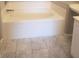 Bathroom featuring a tub and tiled floor at 5655 E Sahara Ave # 2068, Las Vegas, NV 89142