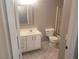 Bright bathroom featuring a vanity with white cabinets and a tiled floor at 5655 E Sahara Ave # 2068, Las Vegas, NV 89142