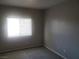 Bedroom with window and neutral carpet and paint at 5655 E Sahara Ave # 2068, Las Vegas, NV 89142
