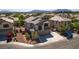 Charming two-story home with a well-maintained yard, mature trees, and a two-car garage at 5712 French Lace Ct, North Las Vegas, NV 89081
