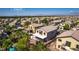 Lovely backyard with a covered patio, lush palm trees, and a sparkling swimming pool at 5712 French Lace Ct, North Las Vegas, NV 89081
