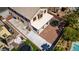 The backyard features a covered patio, perfect for enjoying the outdoors, complete with trampoline and privacy at 5712 French Lace Ct, North Las Vegas, NV 89081