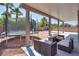 Backyard with covered patio and trampoline, ideal for relaxation and entertainment at 5712 French Lace Ct, North Las Vegas, NV 89081