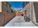 Driveway showing a long paved area next to the house and a block wall at 5712 French Lace Ct, North Las Vegas, NV 89081