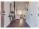 Inviting foyer with hardwood floors, soaring ceilings, and an open view to the living and dining areas at 5712 French Lace Ct, North Las Vegas, NV 89081