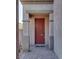 Close-up of the front door with sidelight and decorative brick columns and trim at 5712 French Lace Ct, North Las Vegas, NV 89081