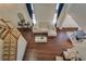 Bright living room with high ceilings, modern furnishings, wood floors, and large windows at 5712 French Lace Ct, North Las Vegas, NV 89081