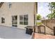 Backyard patio with outdoor fire pit and small pet area, perfect for entertaining and relaxation at 5816 Glory Canyon Way, Las Vegas, NV 89142