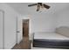 Inviting bedroom featuring a ceiling fan and ensuite bathroom at 5816 Glory Canyon Way, Las Vegas, NV 89142