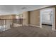 Spacious loft area with railing and carpeted floors at 5816 Glory Canyon Way, Las Vegas, NV 89142