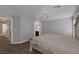 Bright main bedroom with an ensuite bathroom and carpeted floors at 5816 Glory Canyon Way, Las Vegas, NV 89142