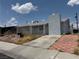 View of the front exterior, showcasing a classic single-story home and driveway at 6432 Bannock Way, Las Vegas, NV 89107
