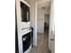 Convenient laundry room with modern stackable washer and dryer at 6432 Bannock Way, Las Vegas, NV 89107