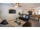 Inviting living room with stylish furniture, TV, and a view of the pool table at 6432 Bannock Way, Las Vegas, NV 89107