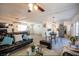 Open concept living space boasts a pool table, dining area, and a modern kitchen at 6432 Bannock Way, Las Vegas, NV 89107