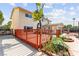 Back of house features a deck and well-manicured landscape at 6612 Elton Ave, Las Vegas, NV 89107
