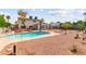 The backyard features a pool and easy-to-maintain desert rock landscape at 6612 Elton Ave, Las Vegas, NV 89107