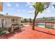 Backyard with red wood deck, beautiful landscaping and pool at 6612 Elton Ave, Las Vegas, NV 89107